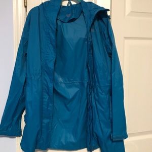 Thin long blue rain jacket